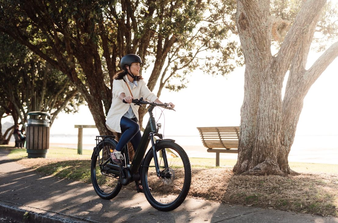 Riding an eBike along the Tauranga waterfront near Memorial Park